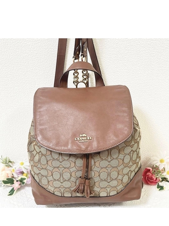 Coach Handbags - Coach Brown Signature Canvas & Leather Flap Backpack -Elle